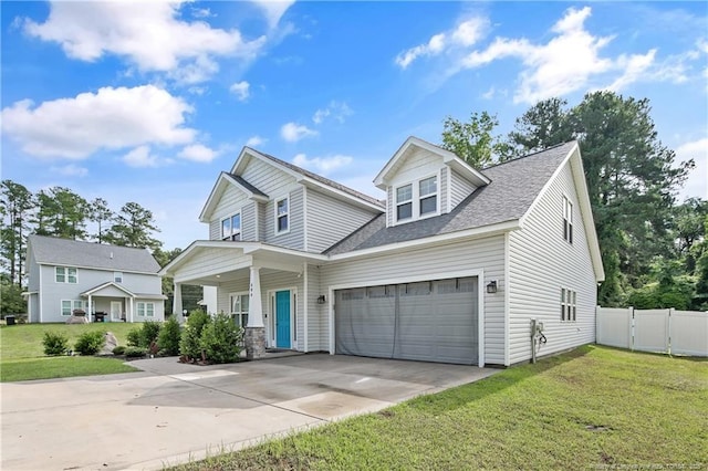 606 N Dickson St, Raeford, NC 28376 - view of front facade with concrete driveway, a porch, a shingled roof, and a garage