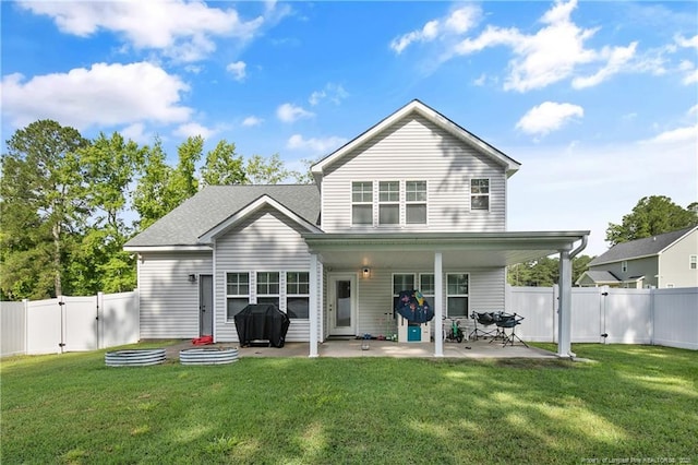 606 N Dickson St, Raeford, NC 28376 - back of property featuring a gate, a patio, and a fenced backyard