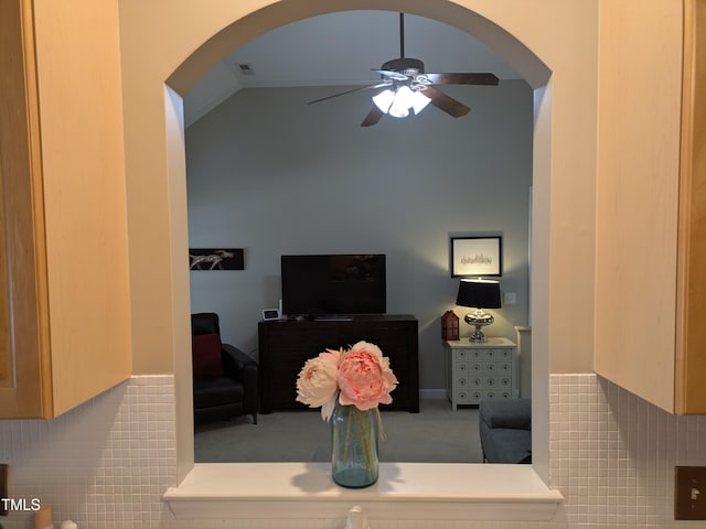 904 E Ivy Valley Dr, Fuquay Varina, NC 27526 - living area with arched walkways, ceiling fan, lofted ceiling, and carpet