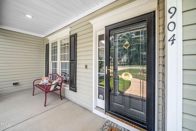 904 E Ivy Valley Dr, Fuquay Varina, NC 27526 - doorway to property featuring covered porch