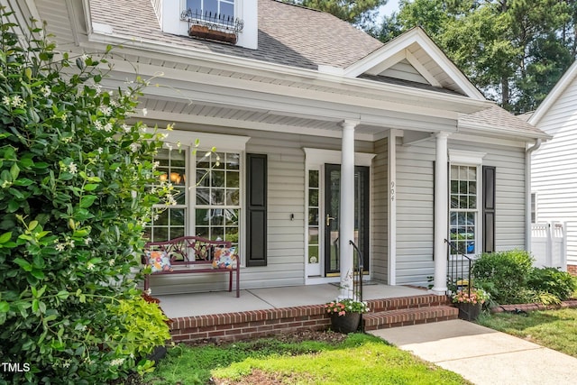904 E Ivy Valley Dr, Fuquay Varina, NC 27526 - entrance to property with covered porch and a shingled roof