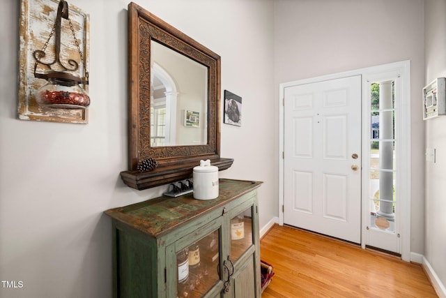904 E Ivy Valley Dr, Fuquay Varina, NC 27526 - entryway with baseboards and light wood-type flooring