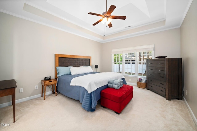 904 E Ivy Valley Dr, Fuquay Varina, NC 27526 - bedroom featuring a raised ceiling, ornamental molding, light carpet, and a ceiling fan