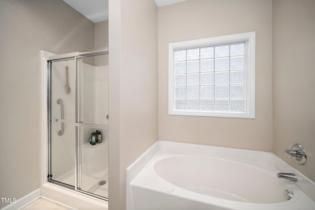904 E Ivy Valley Dr, Fuquay Varina, NC 27526 - bathroom featuring a shower stall and a bath