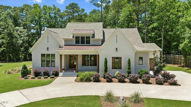 8420 Bells Lake Rd, Apex, NC 27539 - modern inspired farmhouse with covered porch, a standing seam roof, a metal roof, roof with shingles, and driveway