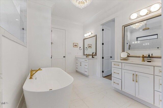 8420 Bells Lake Rd, Apex, NC 27539 - full bath featuring a chandelier, marble look tiles, a soaking tub, two vanities, and crown molding