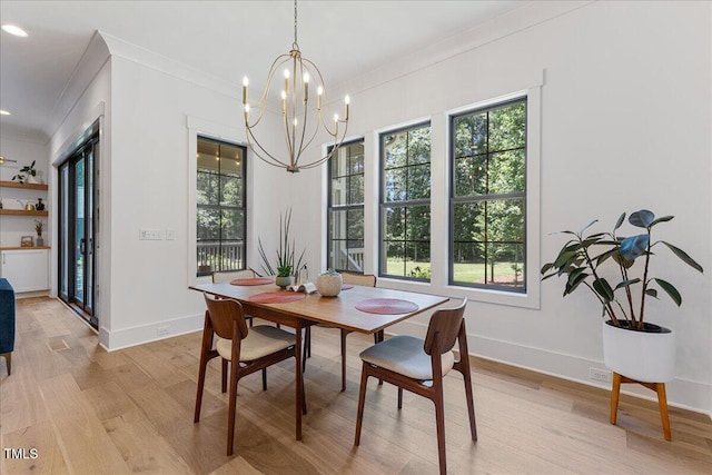 8420 Bells Lake Rd, Apex, NC 27539 - dining space with crown molding, light wood finished floors, a chandelier, and recessed lighting