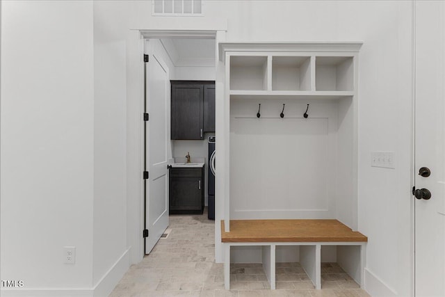 8420 Bells Lake Rd, Apex, NC 27539 - mudroom featuring baseboards and a sink