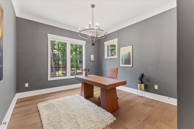 8420 Bells Lake Rd, Apex, NC 27539 - home office with a chandelier, light wood finished floors, and crown molding