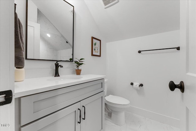 8420 Bells Lake Rd, Apex, NC 27539 - bathroom featuring marble look tiles, vanity, and lofted ceiling
