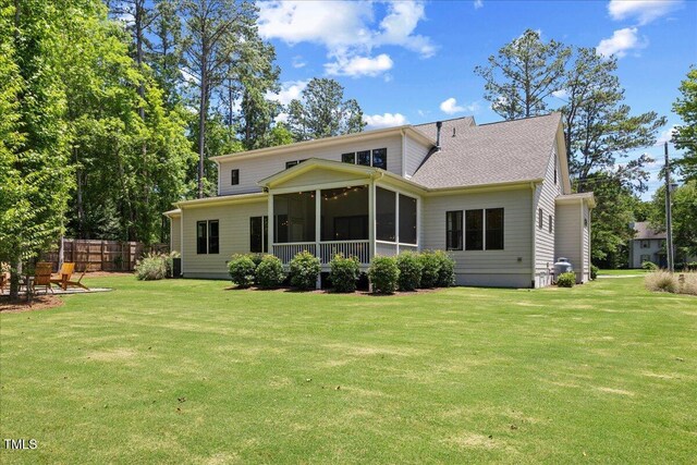 8420 Bells Lake Rd, Apex, NC 27539 - back of property featuring a sunroom
