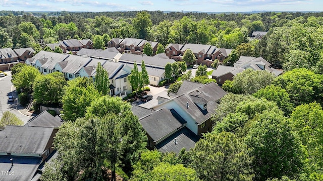 145 Cofield Cir, Durham, NC 27707 - aerial view of residential area with a heavily wooded area