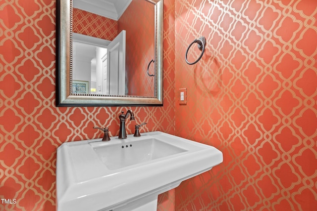 145 Cofield Cir, Durham, NC 27707 - bathroom with wallpapered walls and a sink