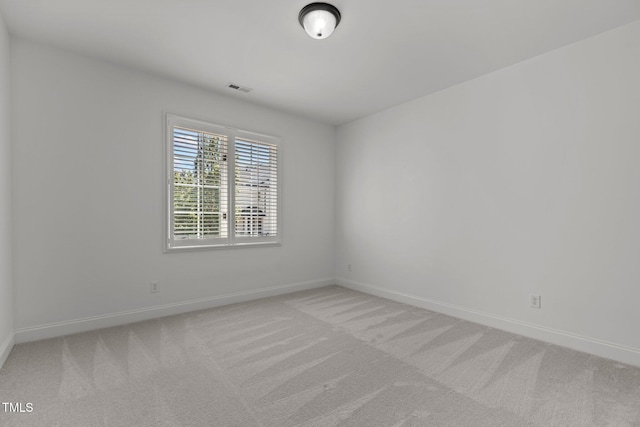 145 Cofield Cir, Durham, NC 27707 - spare room featuring light colored carpet and baseboards