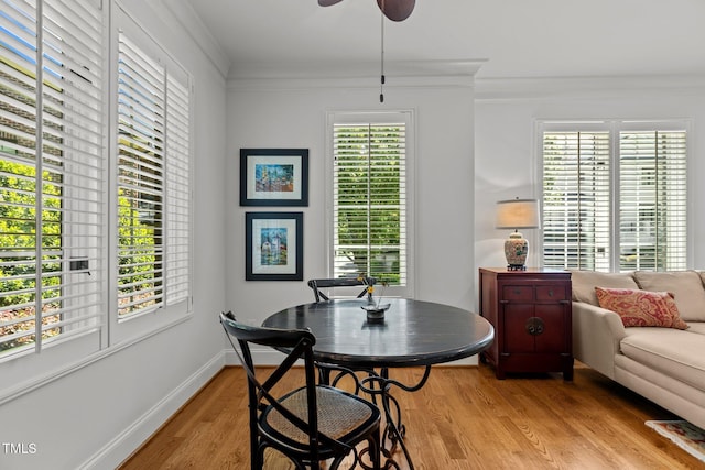 145 Cofield Cir, Durham, NC 27707 - dining space with light wood-style floors, ornamental molding, and a ceiling fan