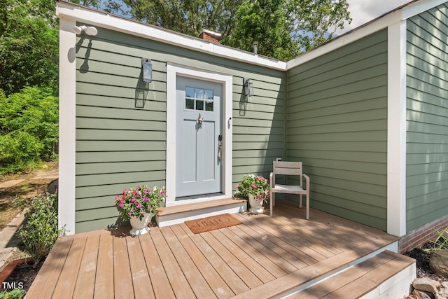 2410 Huron St, Durham, NC 27707 - property entrance featuring a deck and a chimney