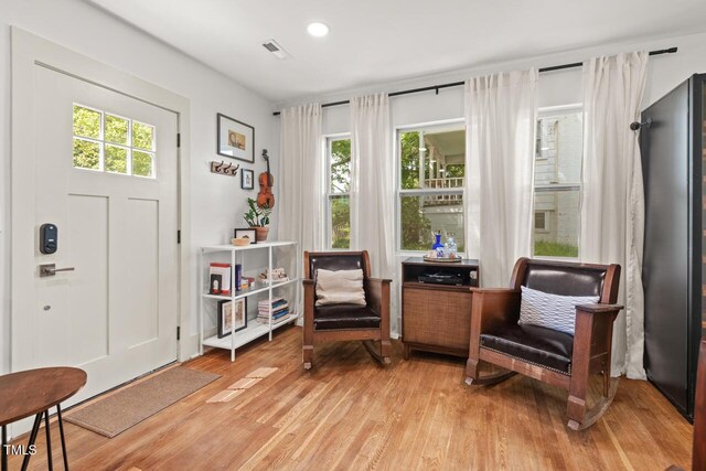2410 Huron St, Durham, NC 27707 - living area featuring wood finished floors and recessed lighting