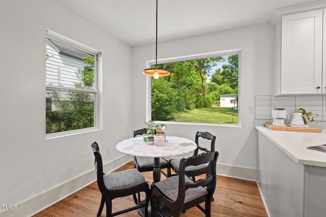 2410 Huron St, Durham, NC 27707 - dining space featuring healthy amount of natural light and light wood-style flooring
