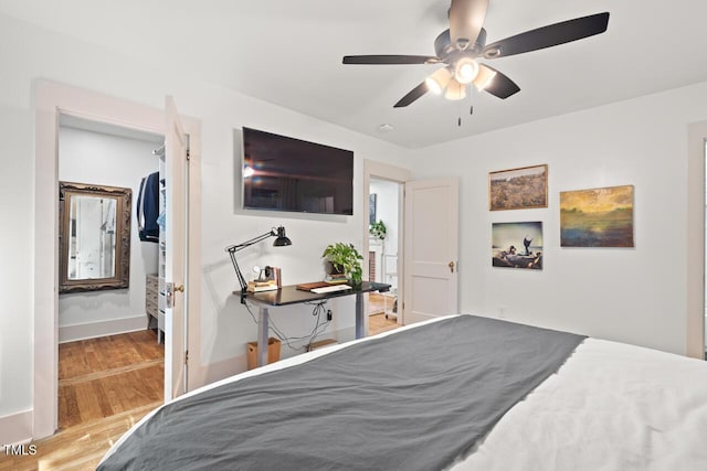 2410 Huron St, Durham, NC 27707 - bedroom featuring wood finished floors and ceiling fan