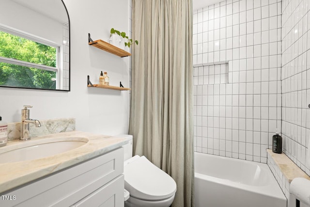 2410 Huron St, Durham, NC 27707 - bathroom featuring shower / tub combo with curtain and vanity
