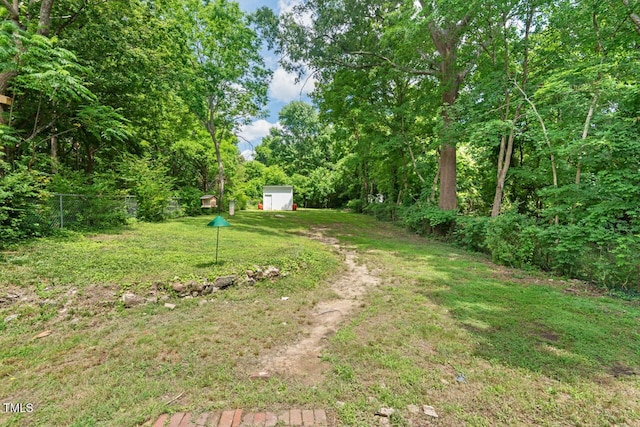 2410 Huron St, Durham, NC 27707 - view of yard featuring a shed