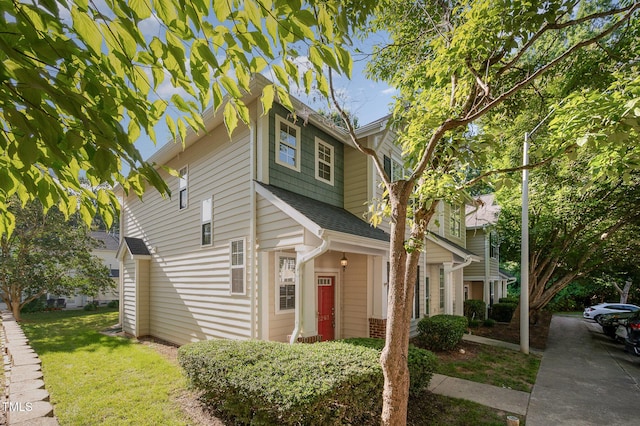 2261 Plum Frost Dr, Raleigh, NC 27603 - view of front facade with roof with shingles