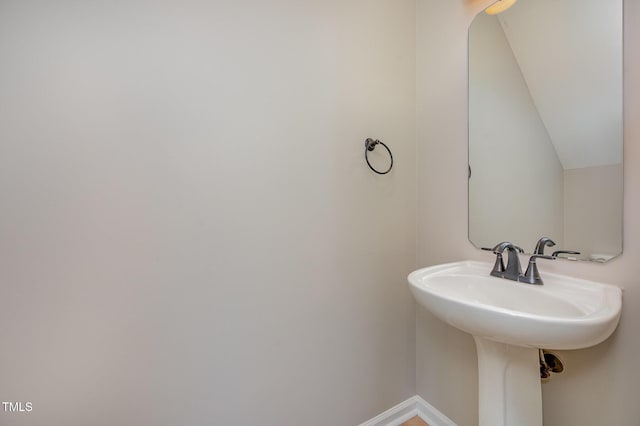 2261 Plum Frost Dr, Raleigh, NC 27603 - bathroom with baseboards and a sink