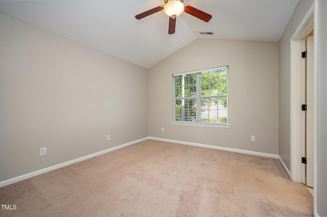 2261 Plum Frost Dr, Raleigh, NC 27603 - empty room featuring ceiling fan, vaulted ceiling, and light carpet