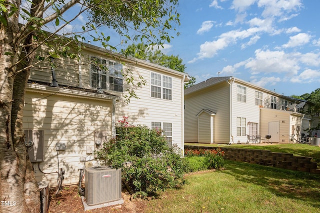 2261 Plum Frost Dr, Raleigh, NC 27603 - back of property with a yard and a patio area