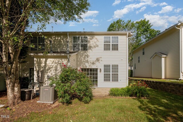 2261 Plum Frost Dr, Raleigh, NC 27603 - rear view of property with a yard