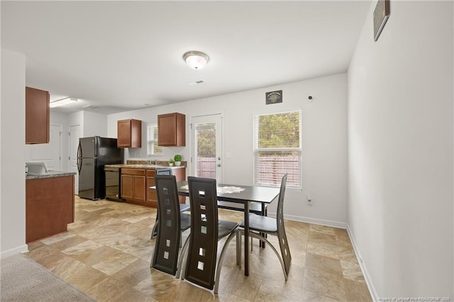 534 Jernigan St, Fayetteville, NC 28306 - dining room with stone finish floors