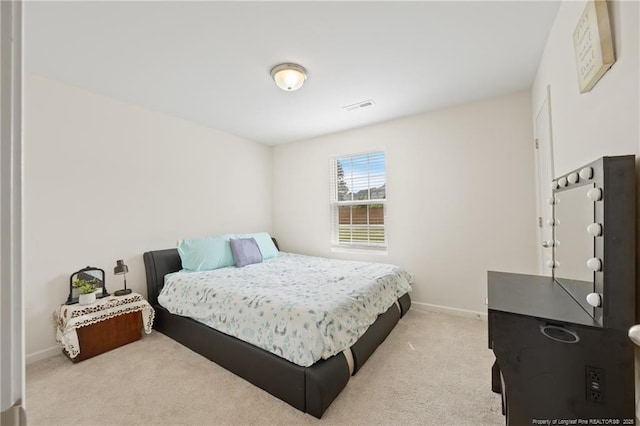 534 Jernigan St, Fayetteville, NC 28306 - bedroom with baseboards and light carpet