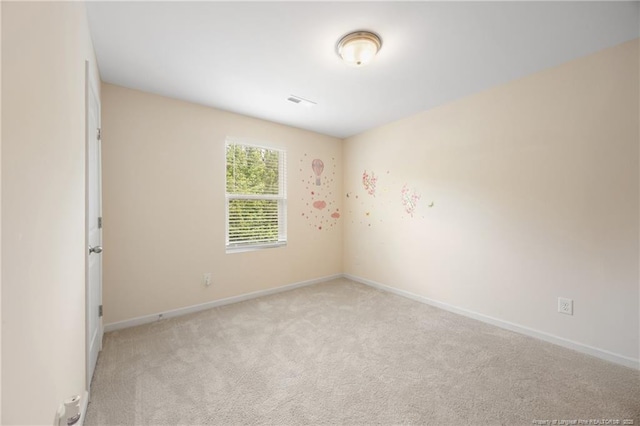 534 Jernigan St, Fayetteville, NC 28306 - carpeted spare room featuring baseboards