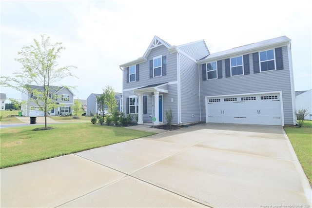 96 Cutty Way, Lillington, NC 27546 - view of front facade featuring a garage, driveway, and a front yard