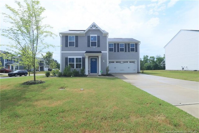 96 Cutty Way, Lillington, NC 27546 - view of front of house featuring an attached garage, driveway, and a front yard