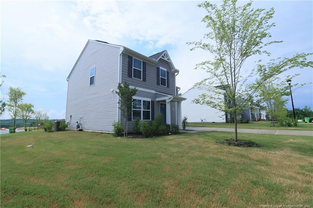 96 Cutty Way, Lillington, NC 27546 - view of side of property with a yard
