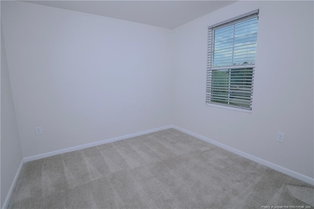 96 Cutty Way, Lillington, NC 27546 - carpeted spare room with baseboards
