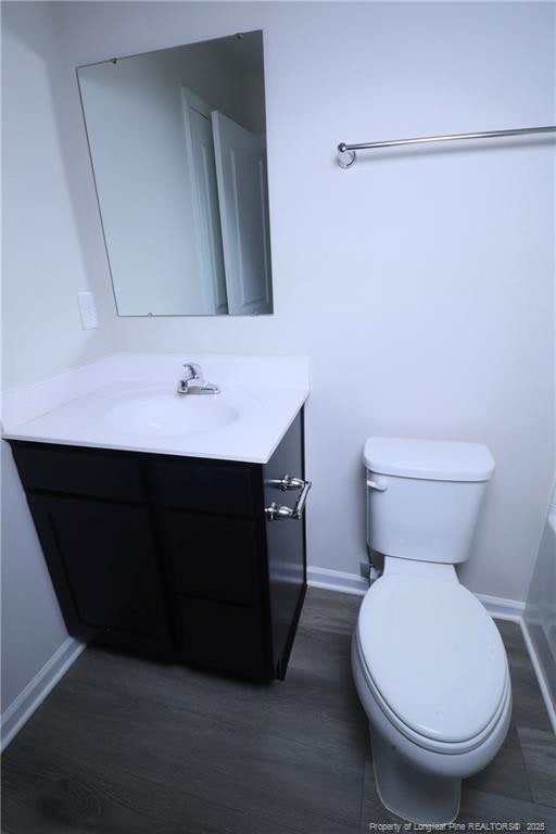 96 Cutty Way, Lillington, NC 27546 - bathroom featuring vanity and wood finished floors