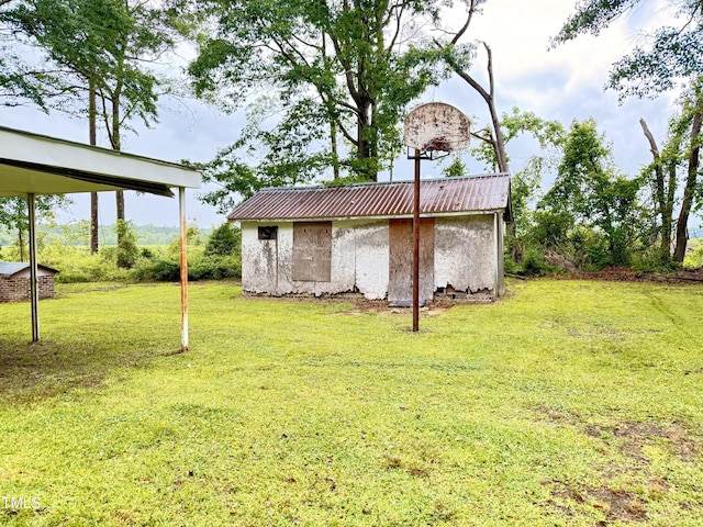 1222 Perkins Rd, Robersonville, NC 27871 - view of green lawn featuring a storage shed