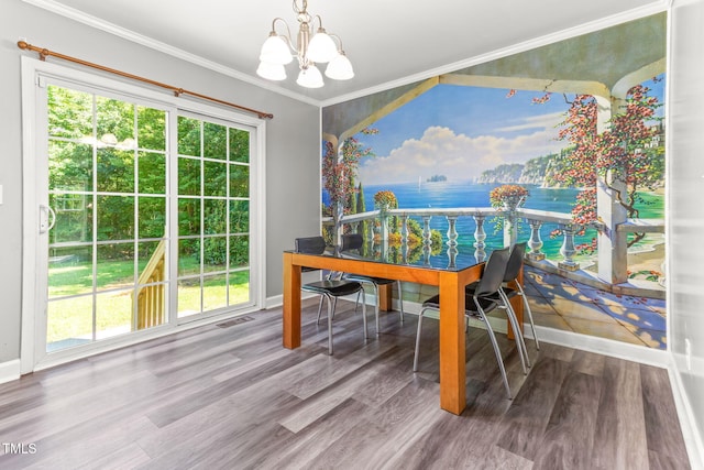 2555 Winding Creek Ln, Franklinton, NC 27525 - dining room with a chandelier, plenty of natural light, crown molding, wood finished floors, and a water view