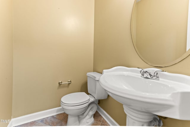 2555 Winding Creek Ln, Franklinton, NC 27525 - bathroom featuring baseboards and tile patterned floors