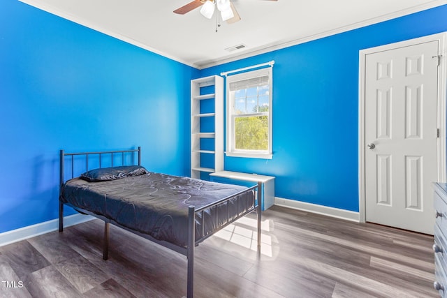 2555 Winding Creek Ln, Franklinton, NC 27525 - bedroom featuring crown molding, wood finished floors, and a ceiling fan