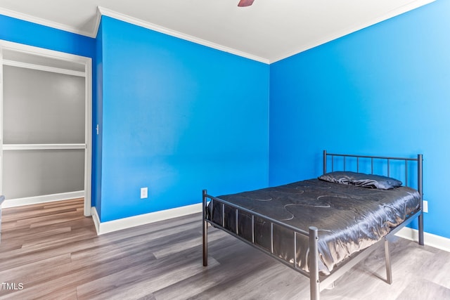2555 Winding Creek Ln, Franklinton, NC 27525 - bedroom with ornamental molding, wood finished floors, and ceiling fan