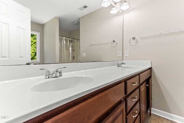 2555 Winding Creek Ln, Franklinton, NC 27525 - full bath featuring double vanity and tile patterned flooring