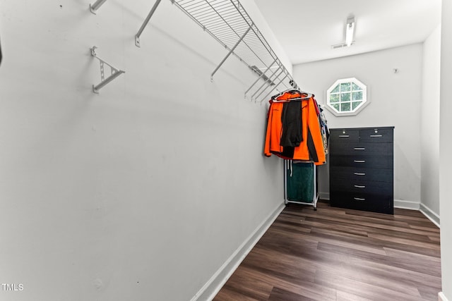 2555 Winding Creek Ln, Franklinton, NC 27525 - spacious closet featuring dark wood-type flooring