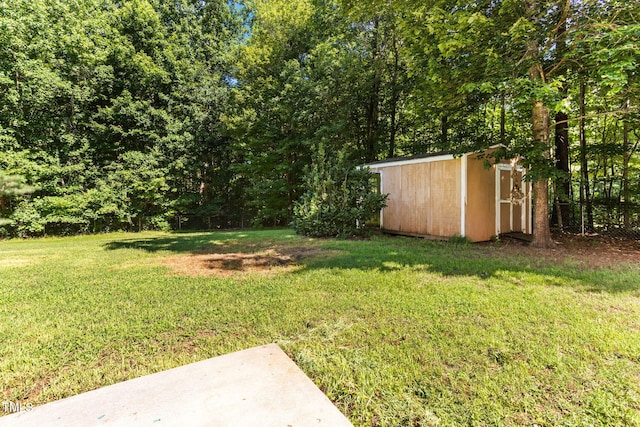 2555 Winding Creek Ln, Franklinton, NC 27525 - view of green lawn featuring a storage unit
