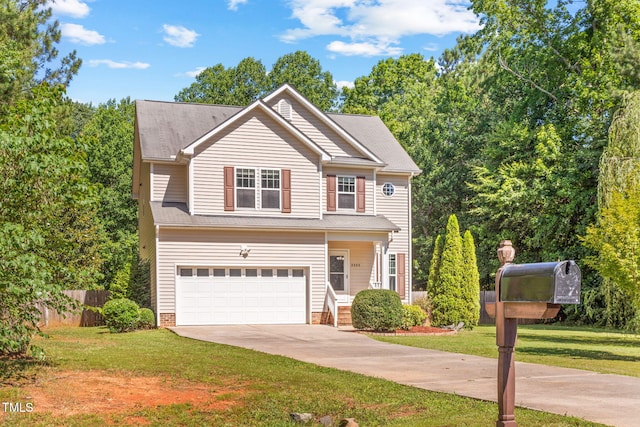 2555 Winding Creek Ln, Franklinton, NC 27525 - view of front of house with an attached garage and concrete driveway
