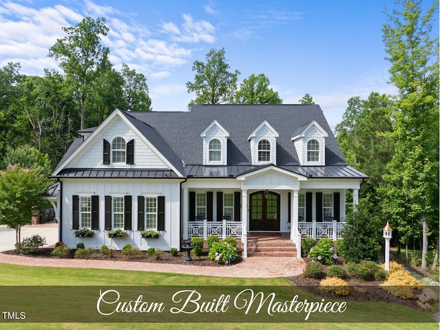 175 Stonecrest Way, Pittsboro, NC 27312 - view of front facade with a standing seam roof, covered porch, board and batten siding, and a front yard