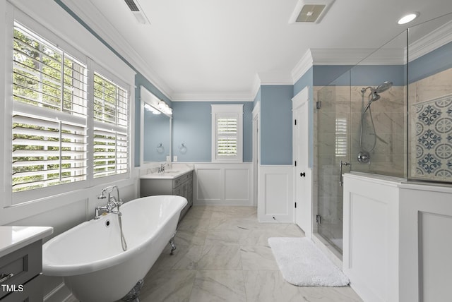 175 Stonecrest Way, Pittsboro, NC 27312 - full bath featuring a shower stall, vanity, a freestanding tub, marble finish flooring, and ornamental molding