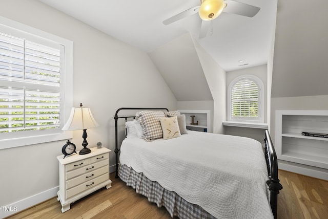 175 Stonecrest Way, Pittsboro, NC 27312 - bedroom with wood finished floors, vaulted ceiling, and ceiling fan